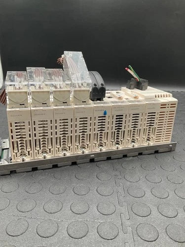 SCHNEIDER ELECTRIC CPS2000 P341000 NOE0100 DDI6402K DDO1602 PLC USED